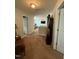 Hallway with carpet, neutral paint, and black accent furniture at 116 Polenta Fields Dr, Smithfield, NC 27577