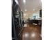 Spacious kitchen featuring stainless steel refrigerator, granite countertops and hardwood floors at 116 Polenta Fields Dr, Smithfield, NC 27577