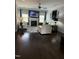 Elegant living room with hardwood floors, a fireplace, and stylish furnishings at 116 Polenta Fields Dr, Smithfield, NC 27577