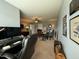 Spacious home office with carpet, a ceiling fan, and a desk for working and studying at 116 Polenta Fields Dr, Smithfield, NC 27577