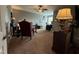 Spacious home office with carpet, a ceiling fan, and several desks for working and studying at 116 Polenta Fields Dr, Smithfield, NC 27577