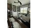 Living room with two chairs and a built in bookcase at 116 Polenta Fields Dr, Smithfield, NC 27577