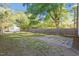 Spacious backyard with a shed, grass, stone pavers, and a wood fence for privacy at 116 W Mciver St, Zebulon, NC 27597