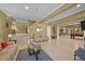 Open basement featuring a relaxing living room, game room, and bar seating at 1174 Robertson Rd, Roxboro, NC 27574