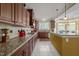 Gourmet kitchen featuring granite countertops and ample cabinet space at 1174 Robertson Rd, Roxboro, NC 27574