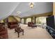 Spacious living room featuring large windows, comfortable seating, and stylish decor at 1174 Robertson Rd, Roxboro, NC 27574