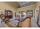 Open-concept living space with second story overlook and classic furnishings at 1174 Robertson Rd, Roxboro, NC 27574
