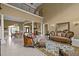 Open floor plan featuring elegant living and dining areas with luxurious furnishings at 1174 Robertson Rd, Roxboro, NC 27574