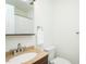 Simple bathroom featuring a vanity, a mirror, and a toilet against a clean and neutral backdrop at 127 Long Shadow Pl, Durham, NC 27713