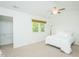 Cozy bedroom featuring a neutral color scheme, a ceiling fan, and a well-organized walk-in closet at 127 Long Shadow Pl, Durham, NC 27713