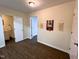 This room features wood flooring, and wall decorations at 127 Long Shadow Pl, Durham, NC 27713