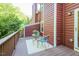 Relaxing deck area with outdoor seating and views of lush greenery at 127 Long Shadow Pl, Durham, NC 27713