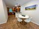 Cozy dining area with a round table, modern chairs, and stylish decor near an open kitchen layout at 127 Long Shadow Pl, Durham, NC 27713