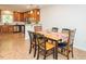 Cozy dining area adjacent to kitchen with natural light, seating for six, and open floor plan at 127 Long Shadow Pl, Durham, NC 27713