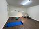 Versatile workout room with hardwood floors, neutral paint, and ample space for home gym equipment at 127 Long Shadow Pl, Durham, NC 27713
