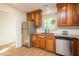 Well-equipped kitchen with stainless steel appliances, granite countertops, and ample storage at 127 Long Shadow Pl, Durham, NC 27713