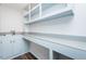 Well-organized utility room featuring ample counter space, sleek cabinetry, and a convenient sink at 127 Long Shadow Pl, Durham, NC 27713