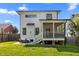 Enjoy outdoor living with a spacious backyard, patio dining, and relaxing screened porch at 1312 Lancaster St, Durham, NC 27701