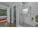 An elegant bathroom features a glass-enclosed shower and a separate toilet room at 1312 Lancaster St, Durham, NC 27701