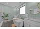 Bright bathroom showcasing dual vanities, a soaking tub, and sleek fixtures at 1312 Lancaster St, Durham, NC 27701