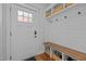 Charming entryway with built-in storage, a bench, and a well-lit doorway at 1312 Lancaster St, Durham, NC 27701