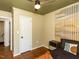 Well decorated bedroom with hardwood floors, accent wall and updated light fixture at 1317 Kelly Rd, Garner, NC 27529