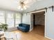 Bright sunroom with a vaulted ceiling, a ceiling fan and access to living area and outdoor view at 1317 Kelly Rd, Garner, NC 27529