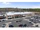 Beautiful exterior shot of a commercial building with a retail complex including a Starbucks and grocery store at 1335 Herb Garden Way, Apex, NC 27502