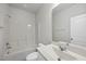 Clean, bright bathroom features a shower-tub combo and modern vanity at 1335 Herb Garden Way, Apex, NC 27502