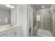 Modern bathroom with glass shower at 1335 Herb Garden Way, Apex, NC 27502