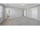 Spacious primary bedroom featuring bathroom ensuite and walk-in closet at 1335 Herb Garden Way, Apex, NC 27502