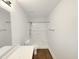 Clean, simple bathroom with a shower-tub combination and white vanity at 1405 Cross Link Rd, Raleigh, NC 27610