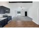 Kitchen view with stainless appliances and open floor plan at 1405 Cross Link Rd, Raleigh, NC 27610