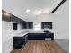 Modern kitchen features sleek cabinetry, stainless steel appliances, and updated countertops at 1405 Cross Link Rd, Raleigh, NC 27610