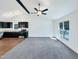 Bright living room featuring high ceilings, recessed lighting and views to the kitchen at 1405 Cross Link Rd, Raleigh, NC 27610