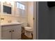 Simple and clean bathroom featuring a single sink and toilet at 1408 Edgebrook Dr, Garner, NC 27529