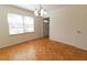 Dining area with parquet wood flooring and bright natural light at 1408 Edgebrook Dr, Garner, NC 27529