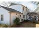 Rear exterior of home features clean design and seamless home and addition integration at 1408 Edgebrook Dr, Garner, NC 27529