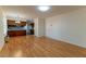 Inviting living area with wood floors that seamlessly connect to the kitchen at 1408 Edgebrook Dr, Garner, NC 27529