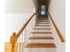 Interior shot of a staircase featuring wooden handrails at 1408 Edgebrook Dr, Garner, NC 27529