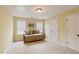 Comfortable bedroom featuring neutral walls, carpet, and a daybed beneath the window at 144 Cobble Ridge Dr, Pittsboro, NC 27312