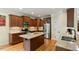 Stylish kitchen features stainless steel appliances, granite countertops, and ample cabinet space at 144 Cobble Ridge Dr, Pittsboro, NC 27312