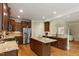 Gourmet kitchen with granite island, stainless appliances, and generous counter space at 144 Cobble Ridge Dr, Pittsboro, NC 27312