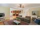 Cozy living room featuring hardwood floors, neutral tones, and a comfortable seating area at 144 Cobble Ridge Dr, Pittsboro, NC 27312