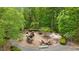 The unique playground features an assortment of structures to encourage creative play at 144 Cobble Ridge Dr, Pittsboro, NC 27312