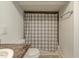 Clean bathroom has white fixtures and a neutral shower curtain at 1542 Albright Ave, Burlington, NC 27215