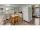 Eat-in kitchen featuring an adjacent laundry area and natural light at 1542 Albright Ave, Burlington, NC 27215