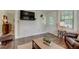 Inviting living room with a decorative fireplace, television and new flooring for comfortable living at 1542 Albright Ave, Burlington, NC 27215