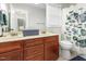 This bathroom features a vanity with dual sinks and a shower with a butterfly curtain at 161 Fort Jackson Rd, Morrisville, NC 27560
