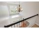 Bright foyer featuring hardwood floors and a decorative chandelier at 161 Fort Jackson Rd, Morrisville, NC 27560
